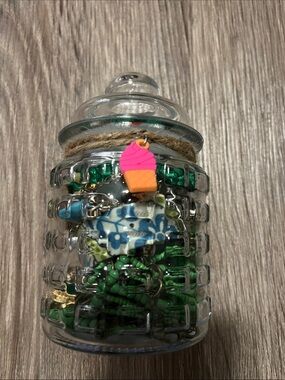 Glass Storage Jar with Green colored jewelry